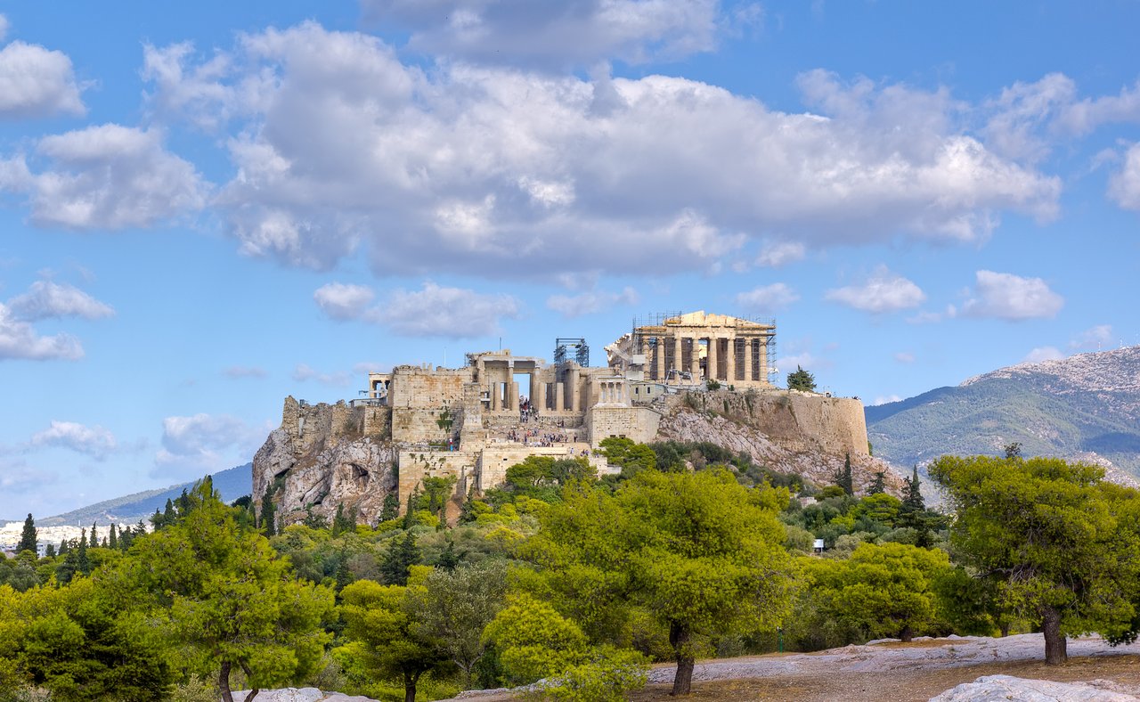 A view of the Acropolis over the treetops.