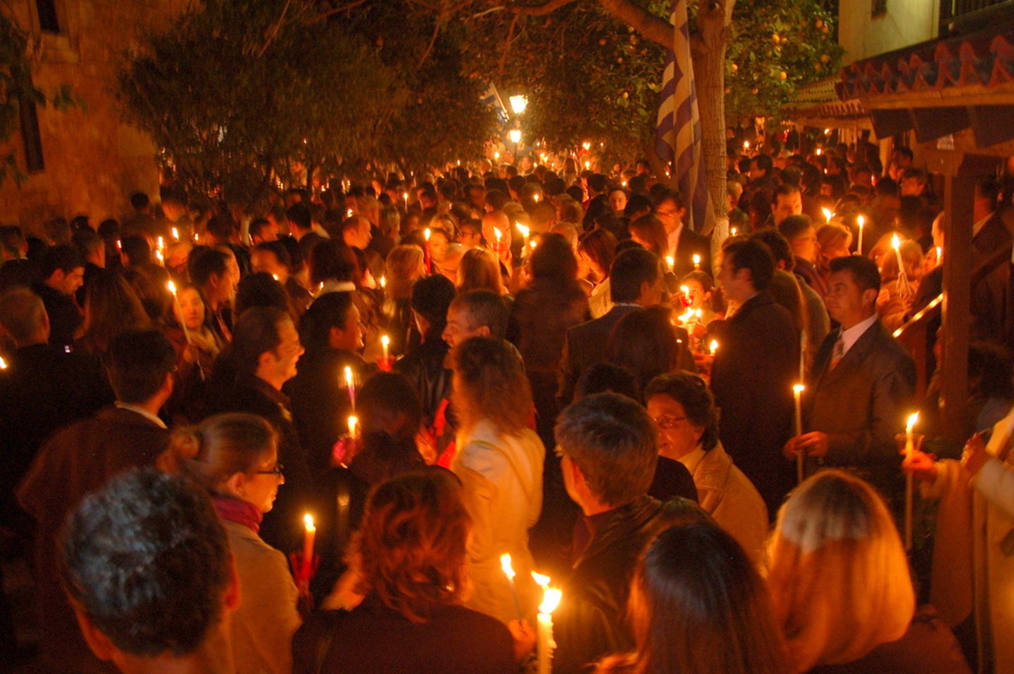 A crowd with candles on Holy Saturday