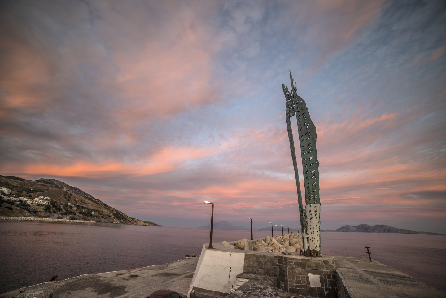 The statue of Icarus overlooking the port at Agios Kirikos, Ikaria island, Greece