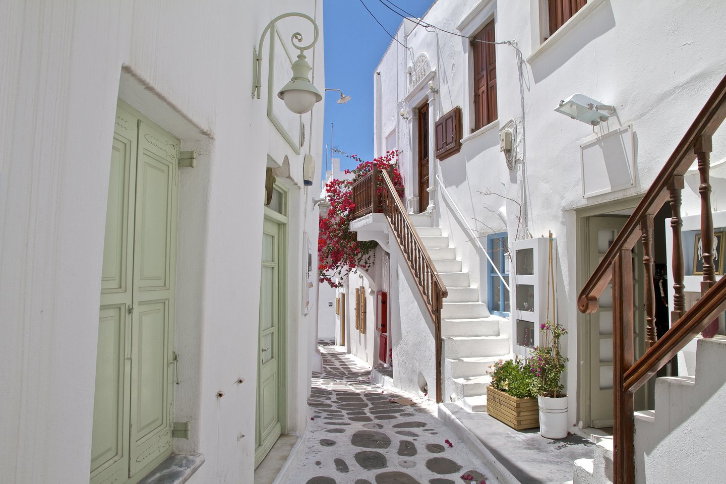 White cobblestone street and buildings in Mykonos Town