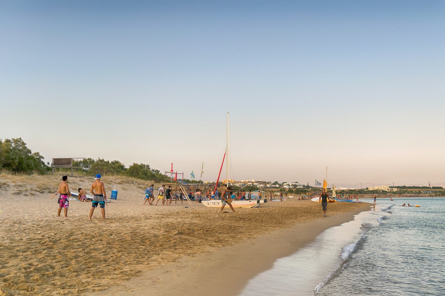 People having fun on Golden Beach in Paros