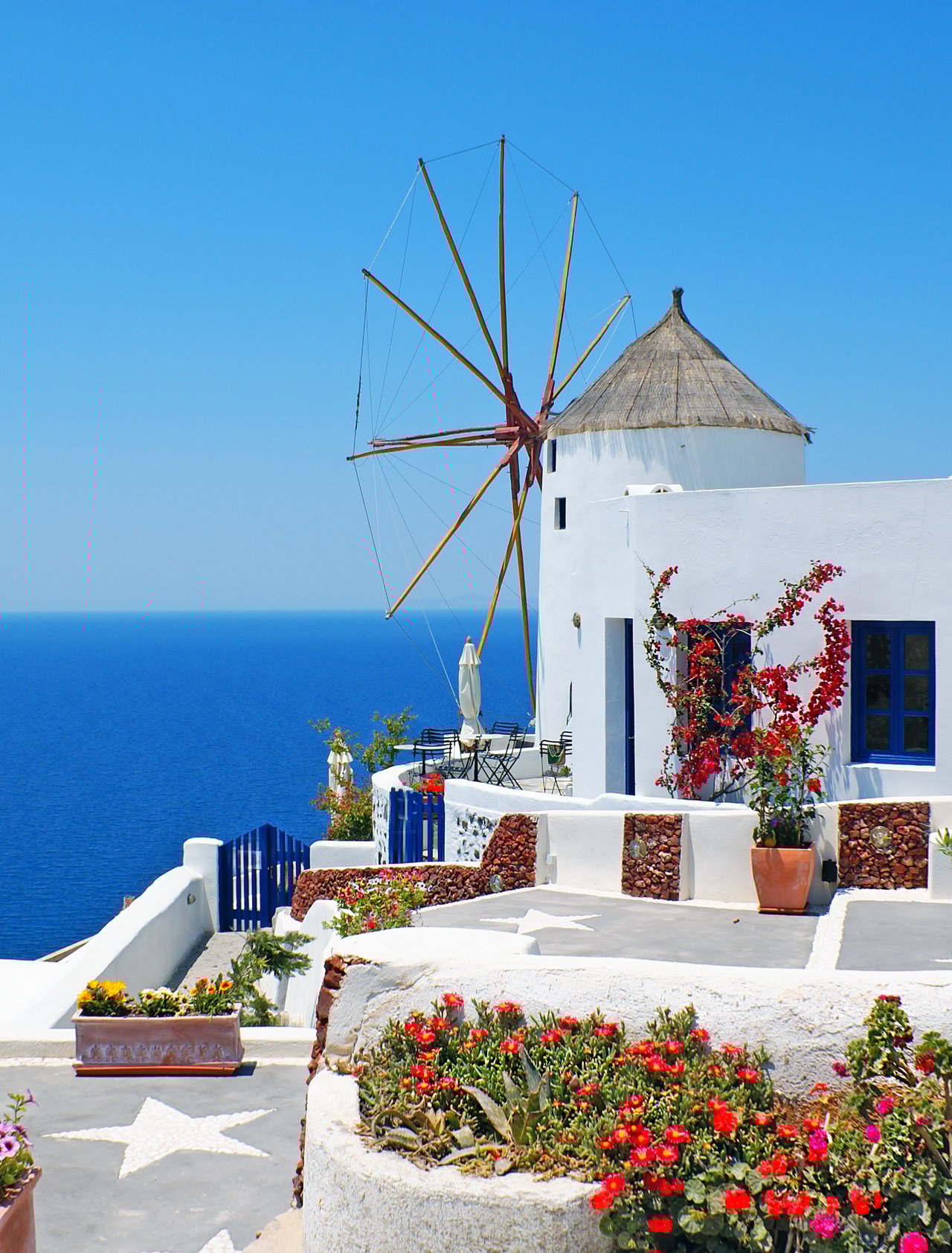 A windmill on the cliff in the village of Oia, Santorini