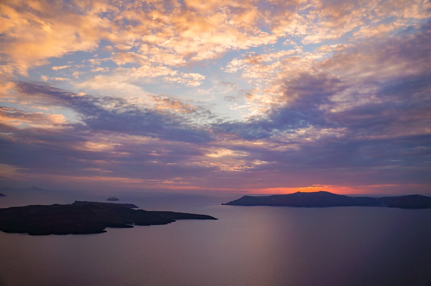 The sun setting over the caldera in Santorini