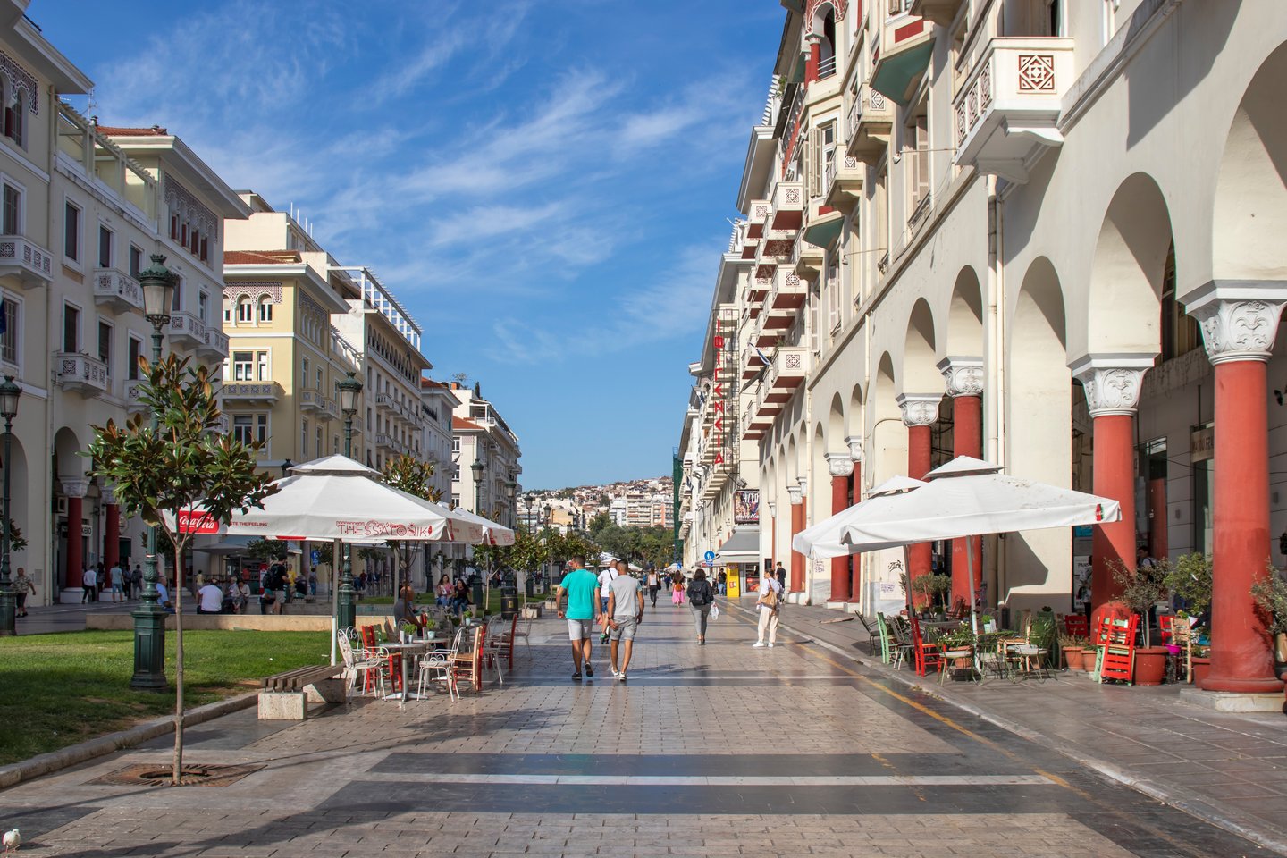 People walking in Aristotelous Square in Thessaloniki, Greece