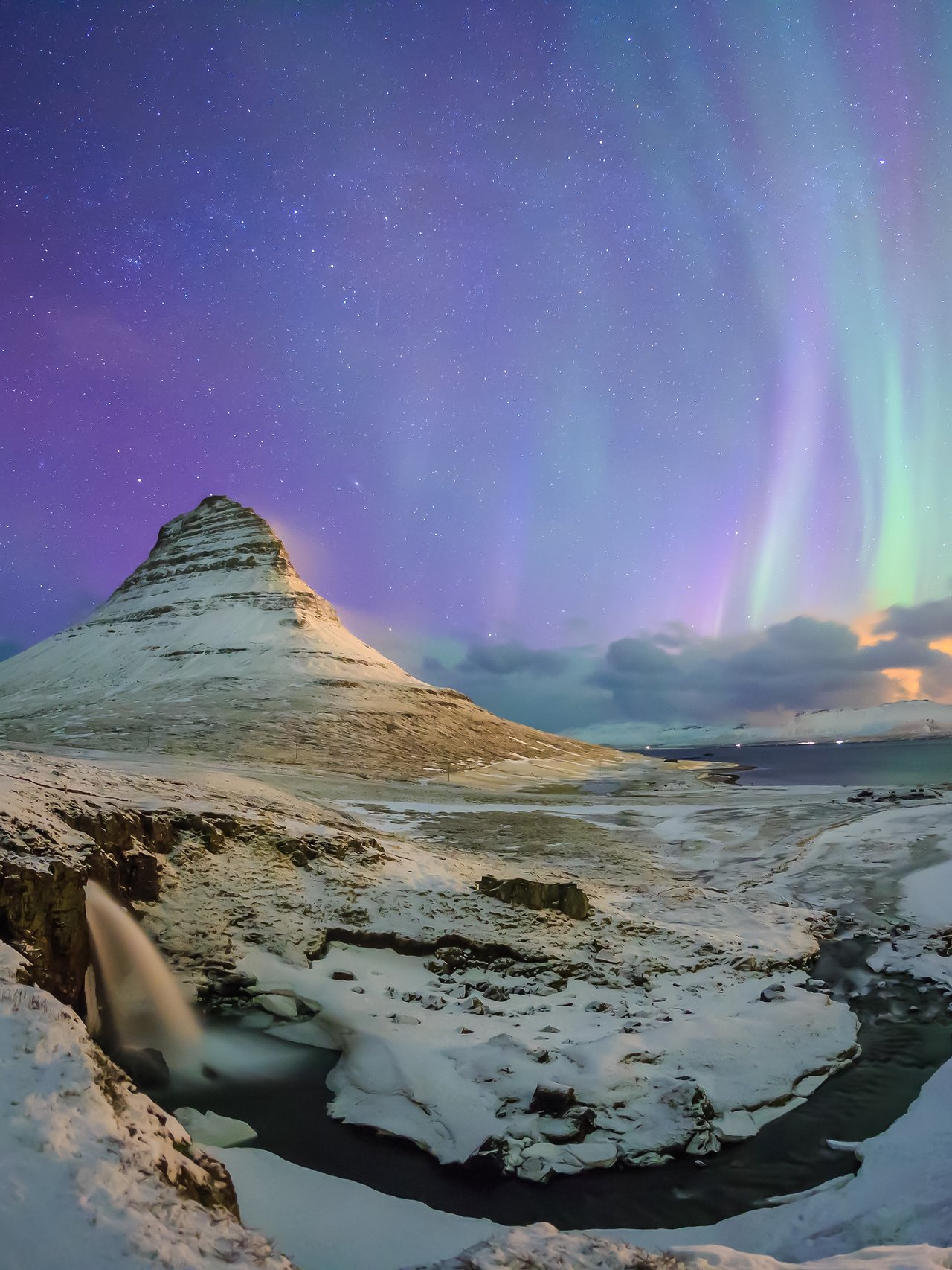 Spectacular northern lights appear over Mount Kirkjufel, Iceland