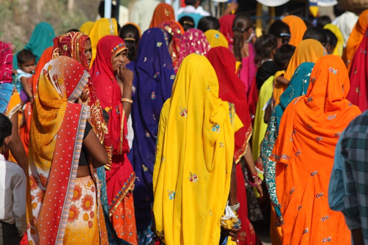 Women in brightly coloured sarees