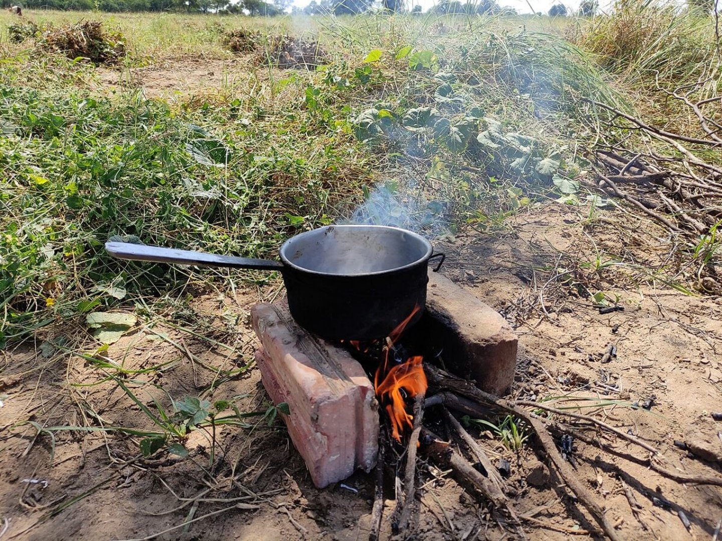 Making chai in a pot over the fire on route to Dwarka, India