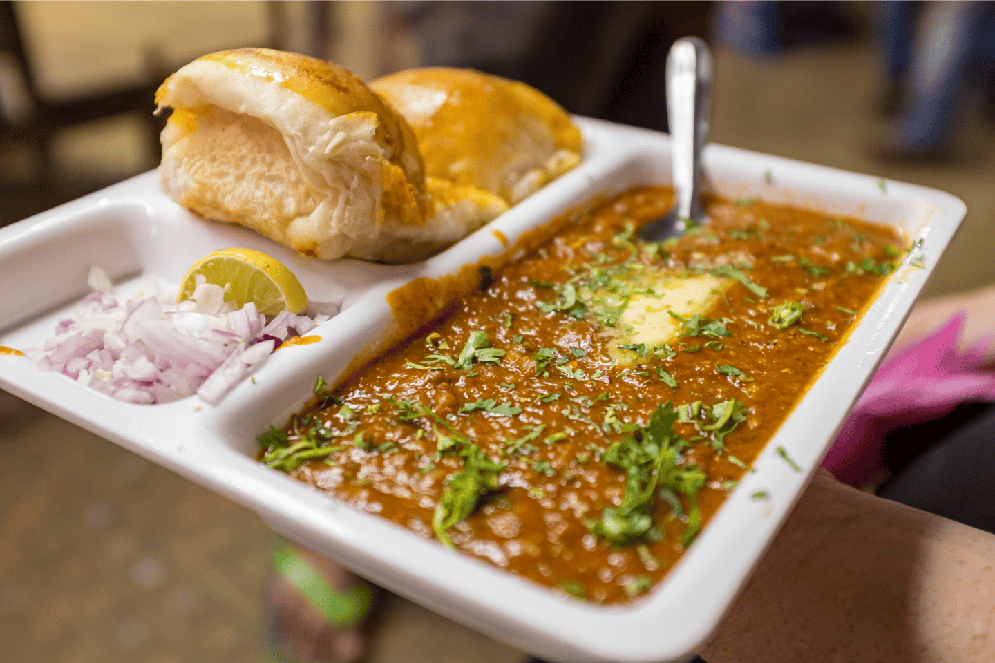 Pav Bhaji served on a tray by a street vendor on Chowpatty beach, south Mumbai