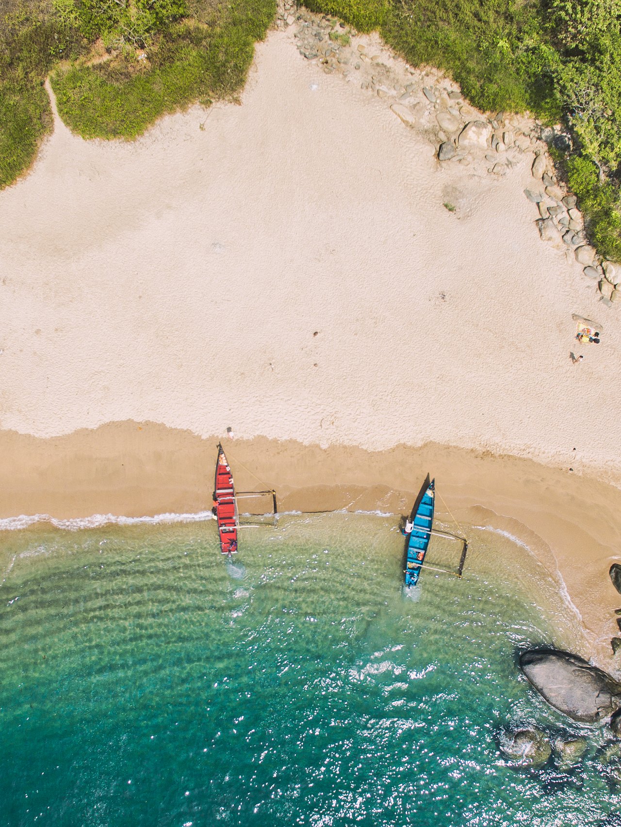 An aerial view of boats on Butterfly Beach in Goa, India