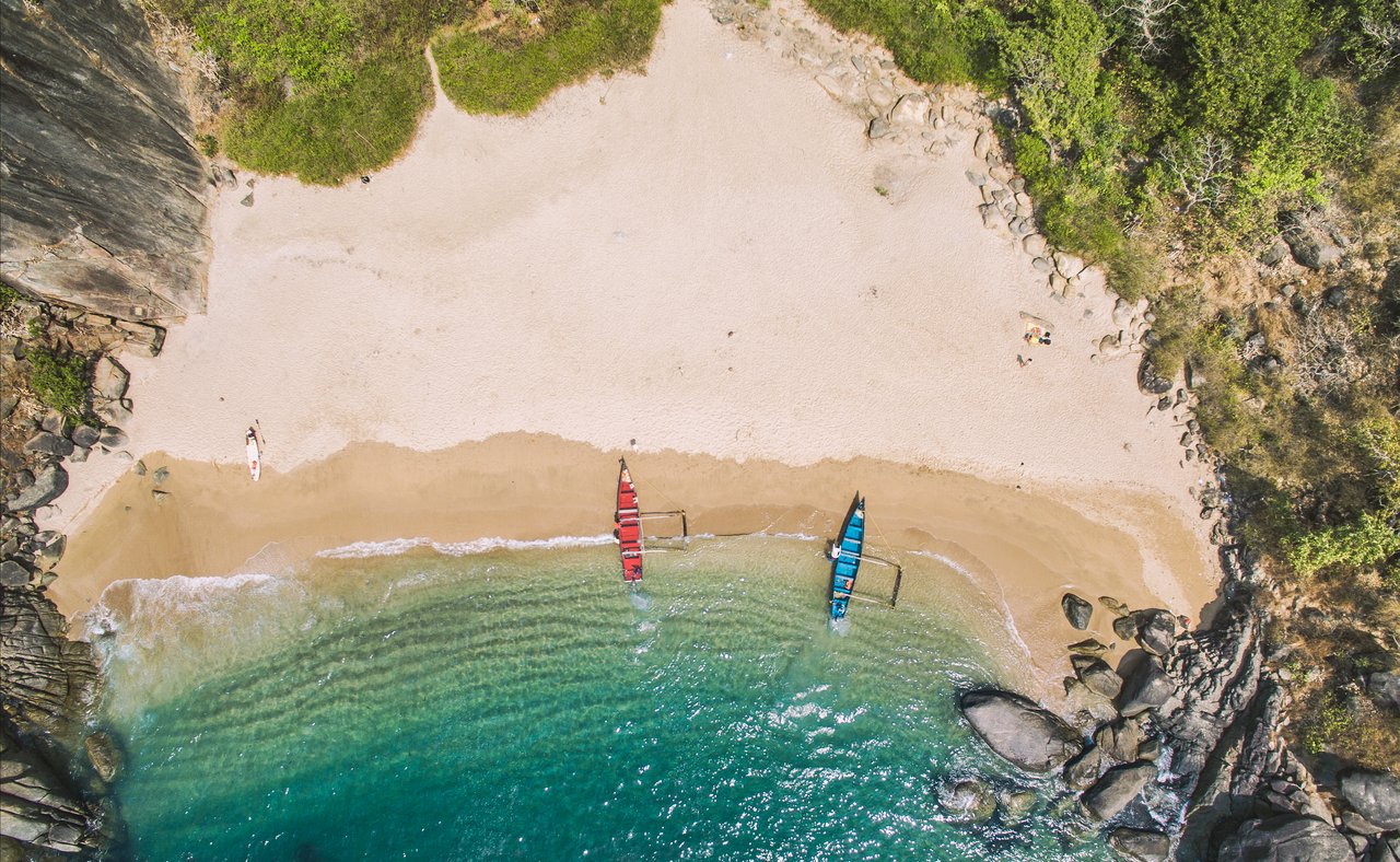 An aerial view of boats on Butterfly Beach in Goa, India