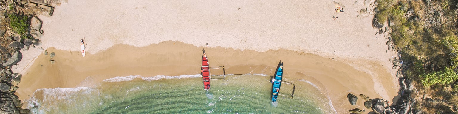 An aerial view of boats on Butterfly Beach in Goa, India