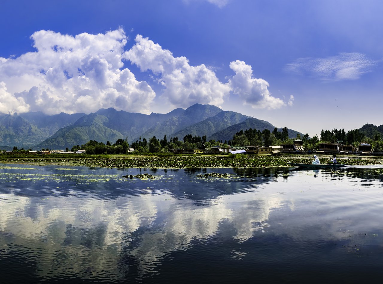 Mountain reflections in Dal Lake