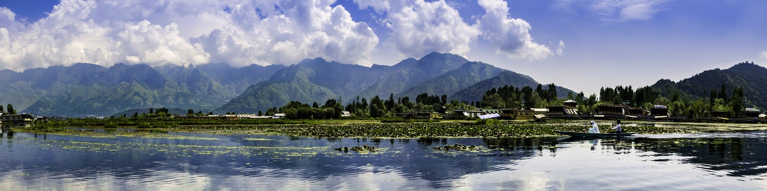 Mountain reflections in Dal Lake