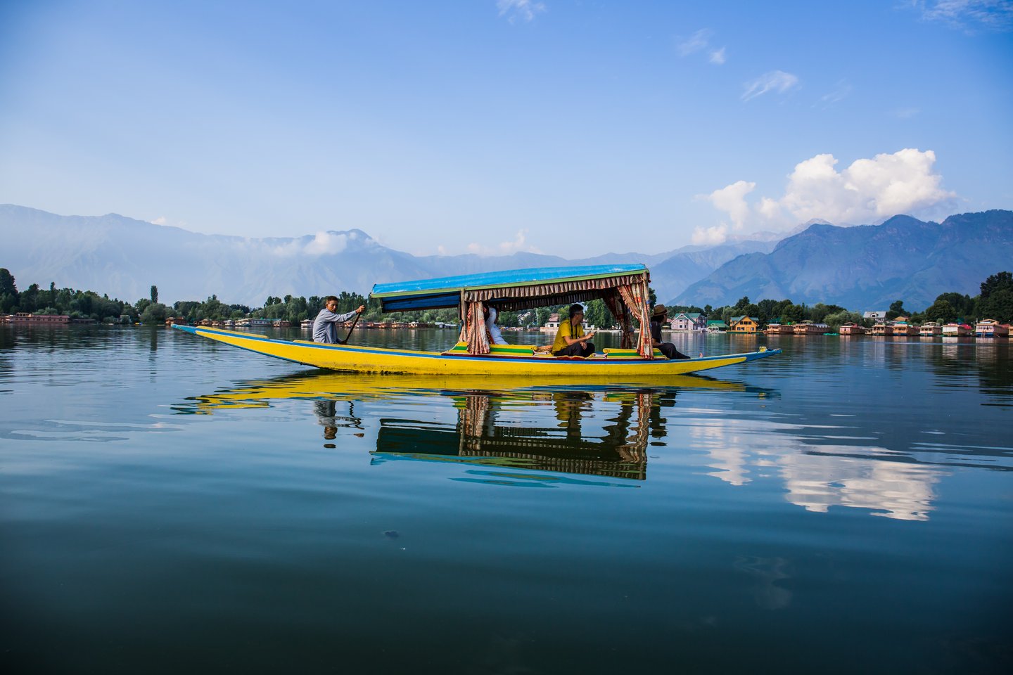 People on a shikara on Lake Dal in summer