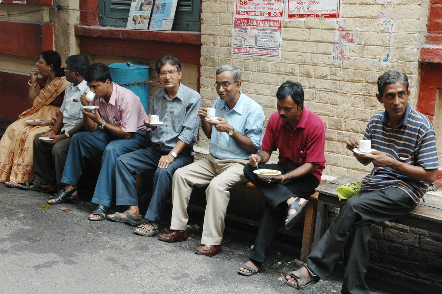 Men drinking tea in Dacres Lane, Kolkata, India.