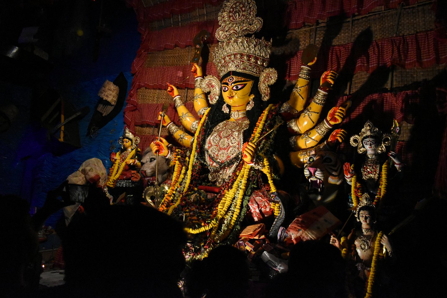Goddess Durga idol at decorated Durga Puja pandal in Kolkata, West Bengal, India.