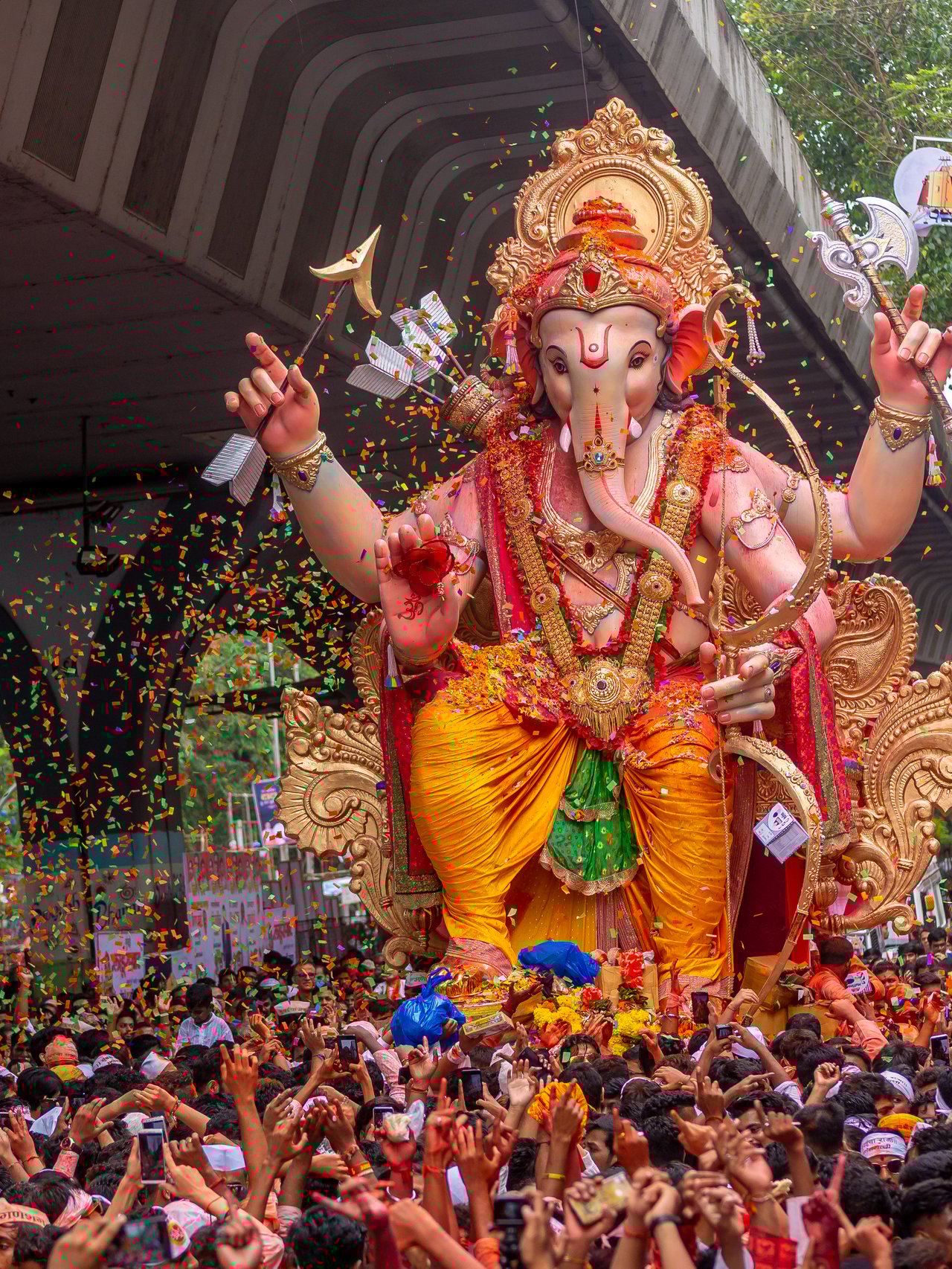 Thousands of people say goodbye Lord Ganesha with colors in Mumbai during Ganesh Visarjan which marks the end of the Ganesh Chaturthi festival.