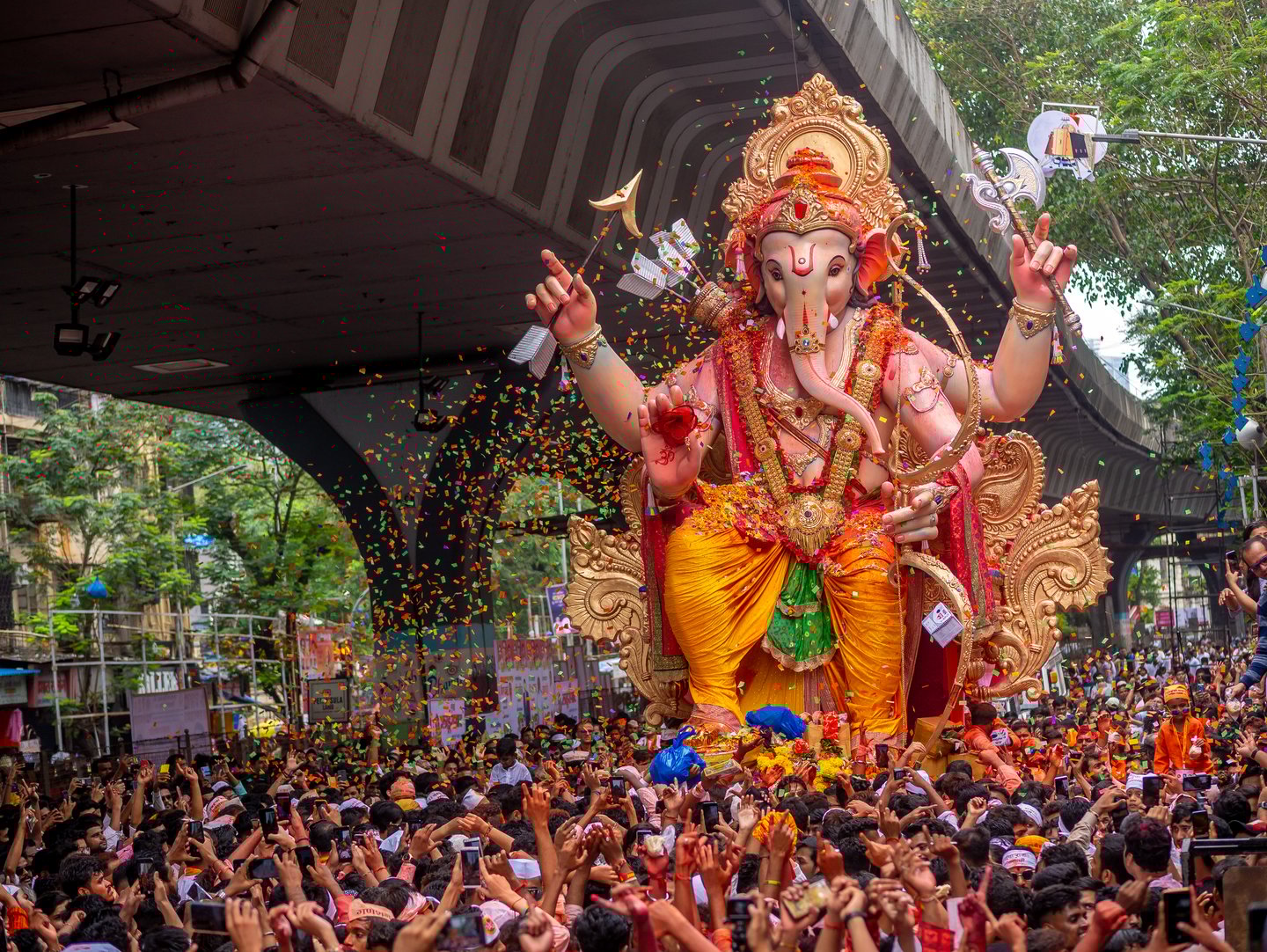 Thousands of people say goodbye Lord Ganesha with colors in Mumbai during Ganesh Visarjan which marks the end of the Ganesh Chaturthi festival.