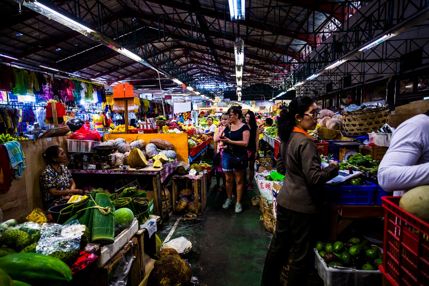 Stalls and people at Badung Market in Bali