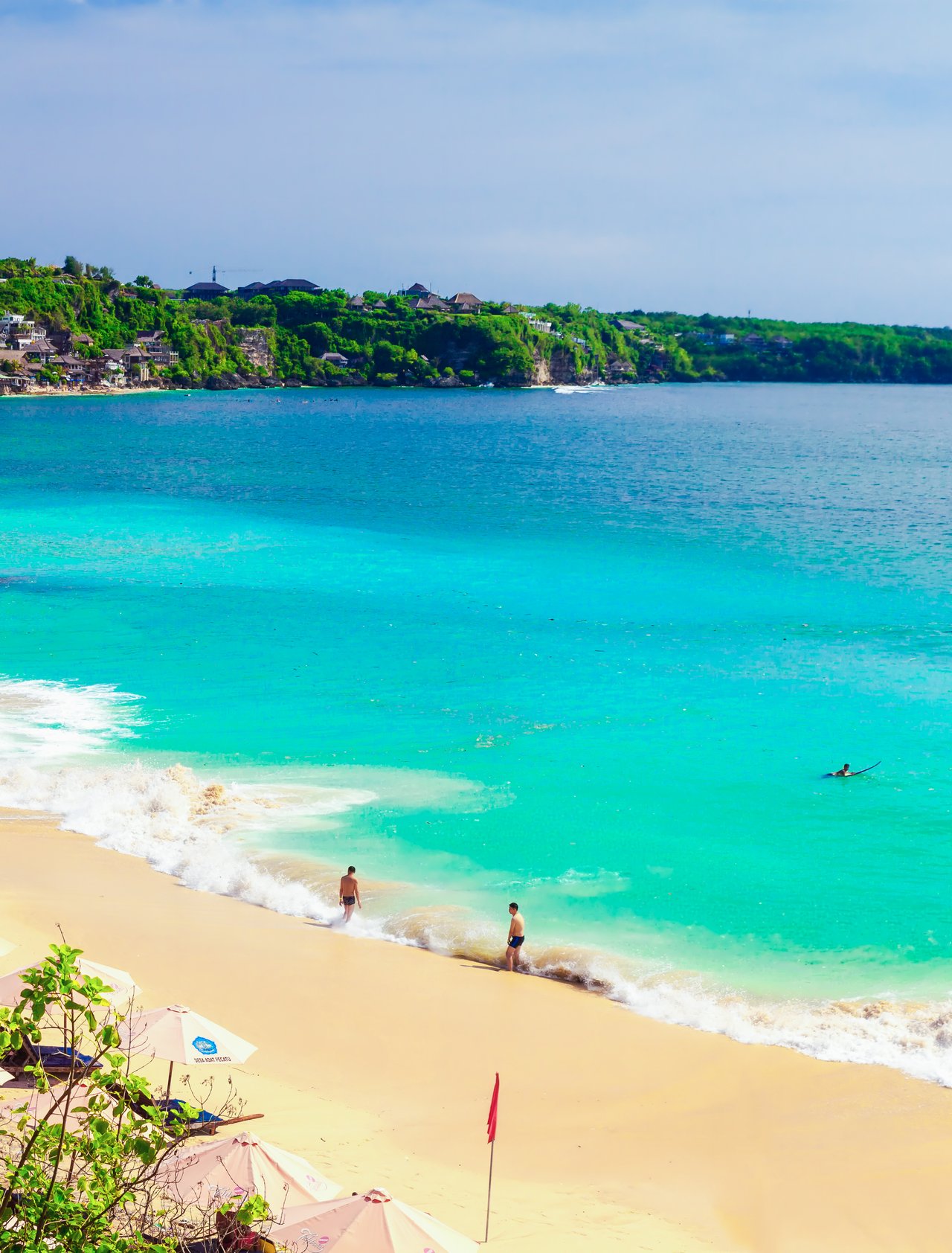 A sunny day at Dreamland Beach in Bali, Indonesia