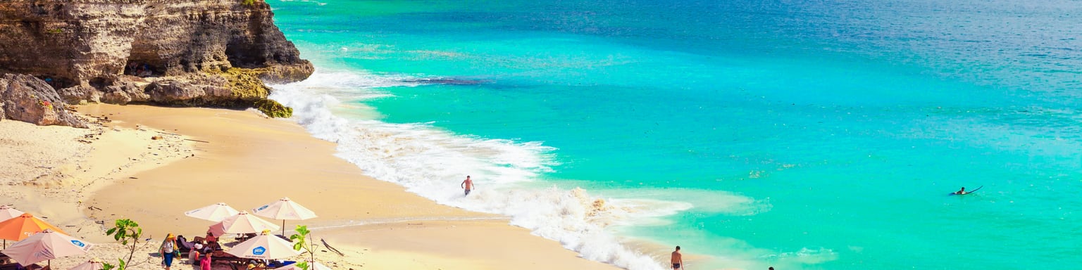 A sunny day at Dreamland Beach in Bali, Indonesia