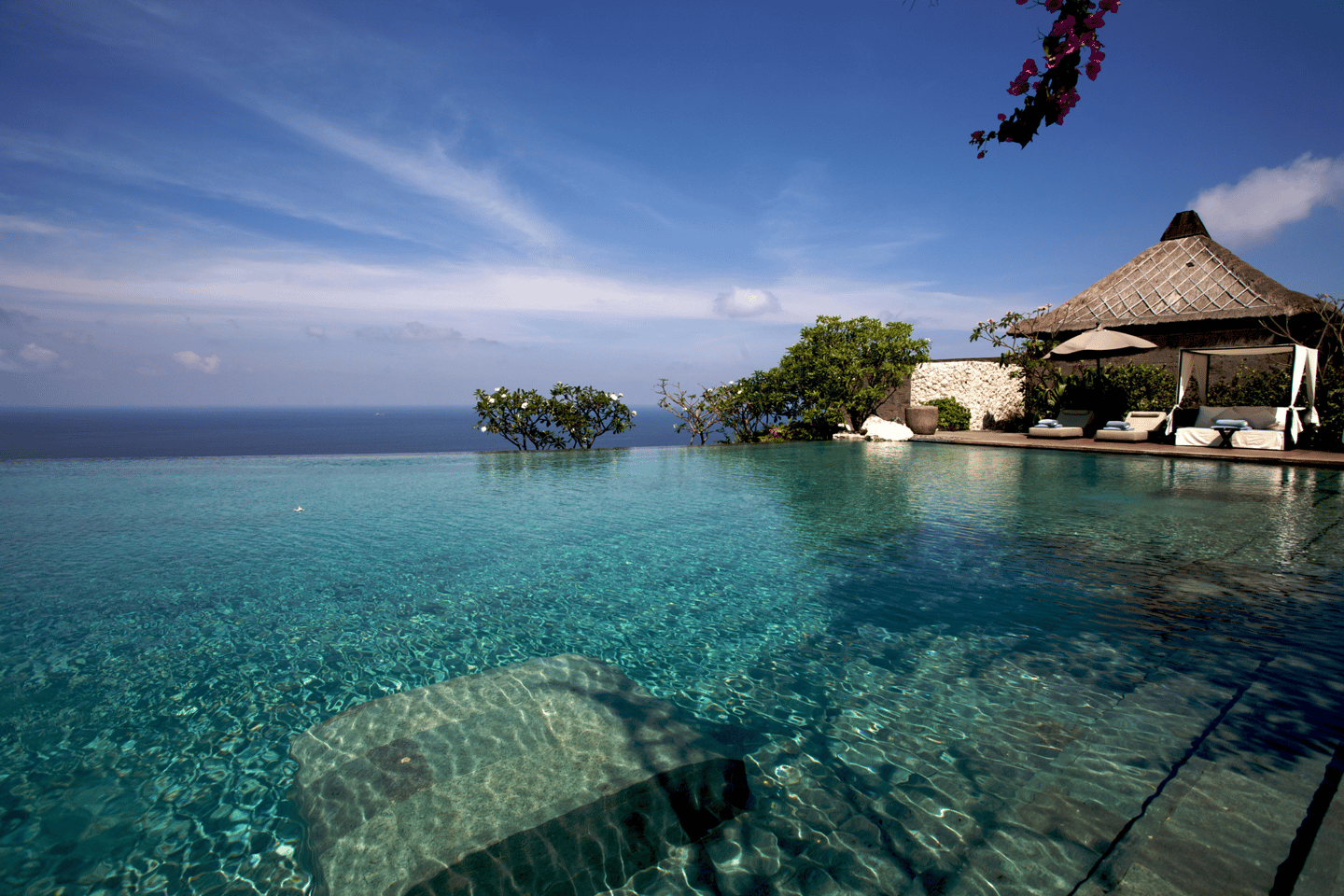 View over an infinity-pool at a resort in Bal