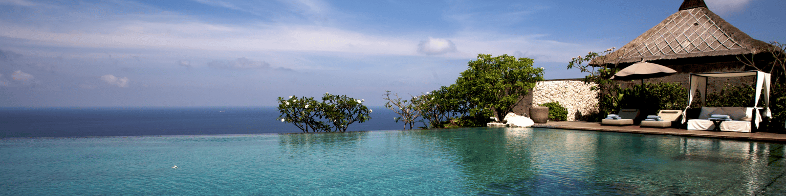 View over an infinity-pool at a resort in Bal