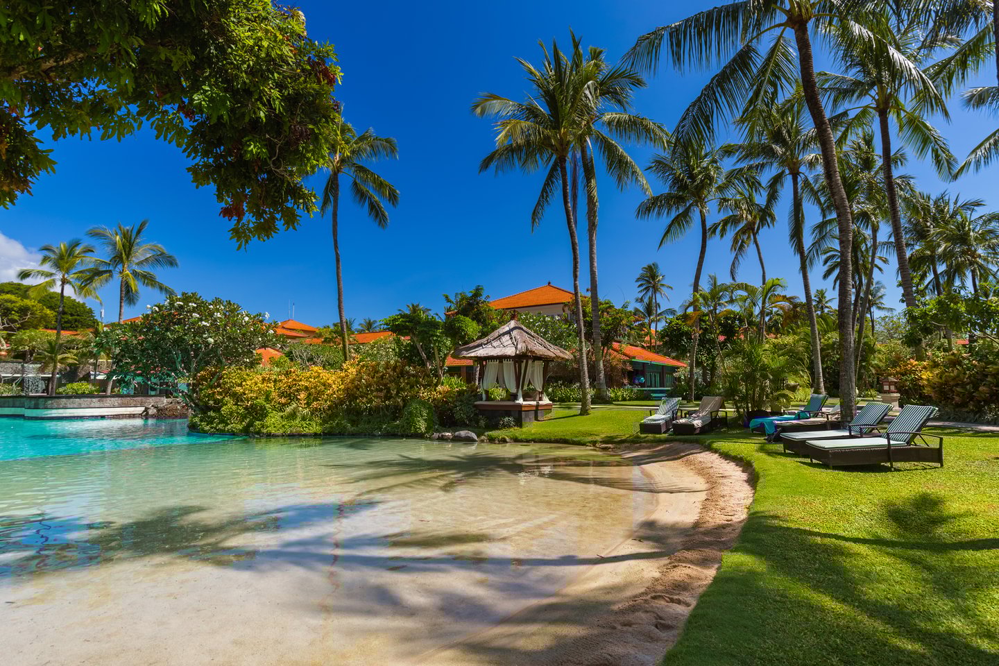 Loungers near the beach at a resort in Nusa Dua, Bali