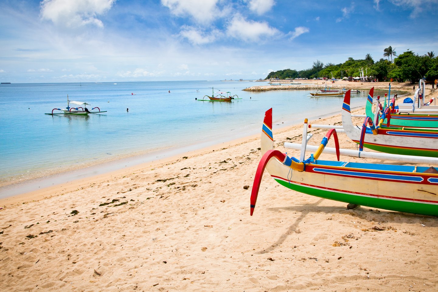 Traditional fishing boats on a beach in Nusa Dua on Bali.