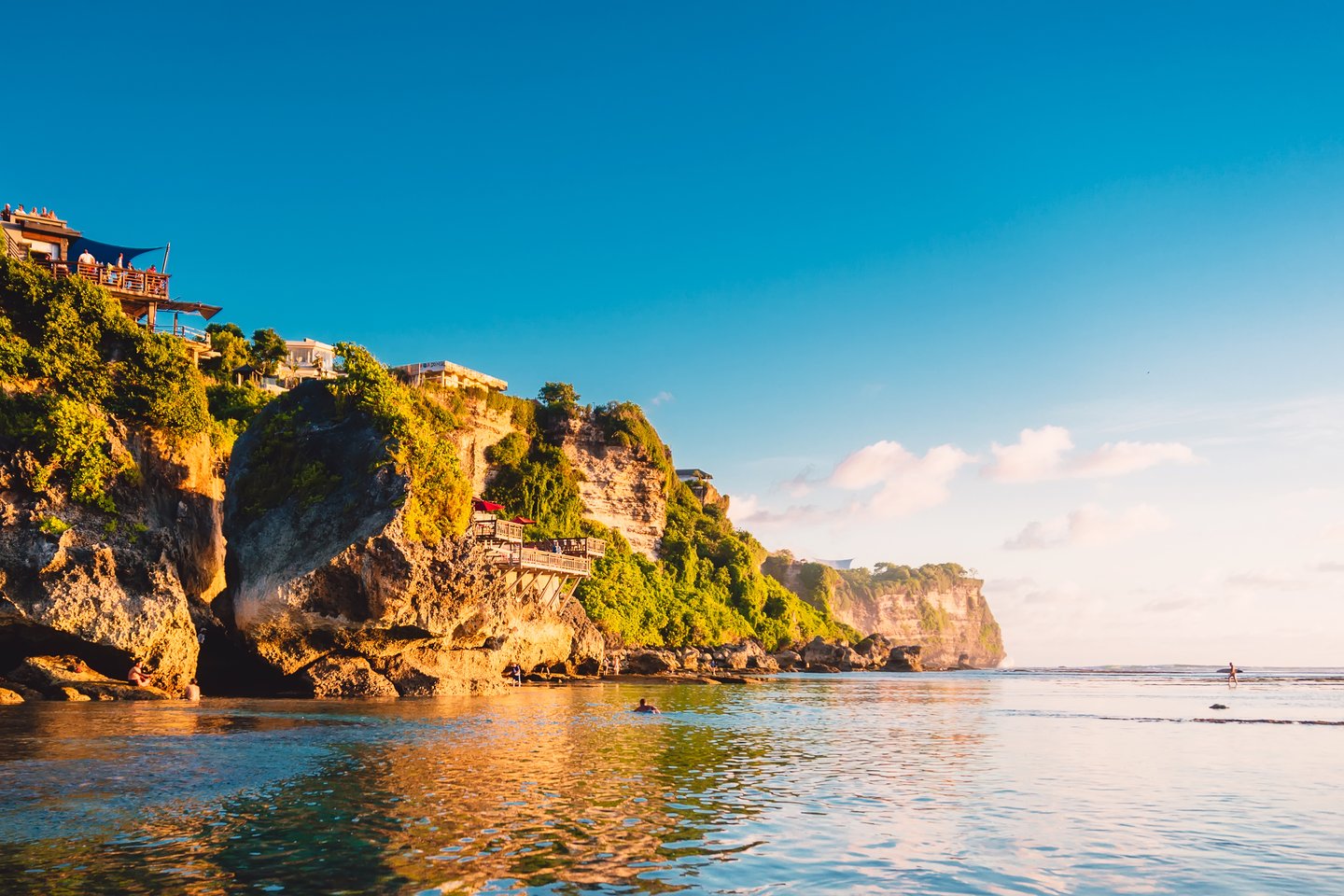 Blue sky, ocean and rocky cliff in Uluwatu, Bali