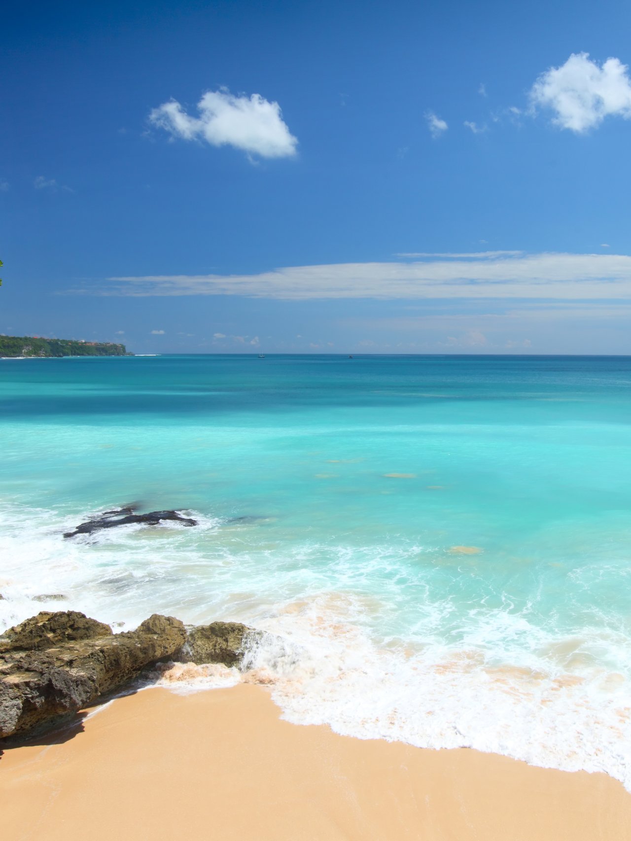 A white sandy beach in Bali, Indonesia.