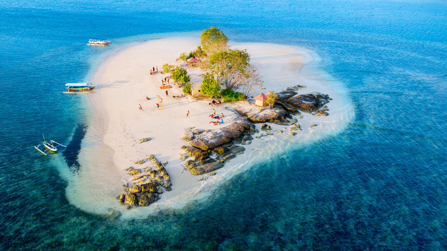 The beautiful Gili Kedis Island surrounded by aquamarine water in Lombok, Indonesia
