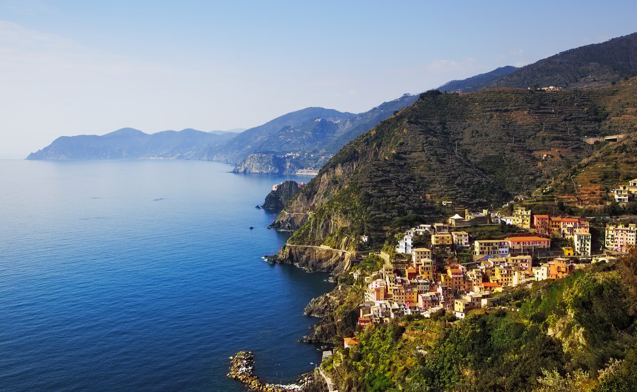An aerial view of Riomaggiore and Via dell Amore in the Cinque Terre National Park