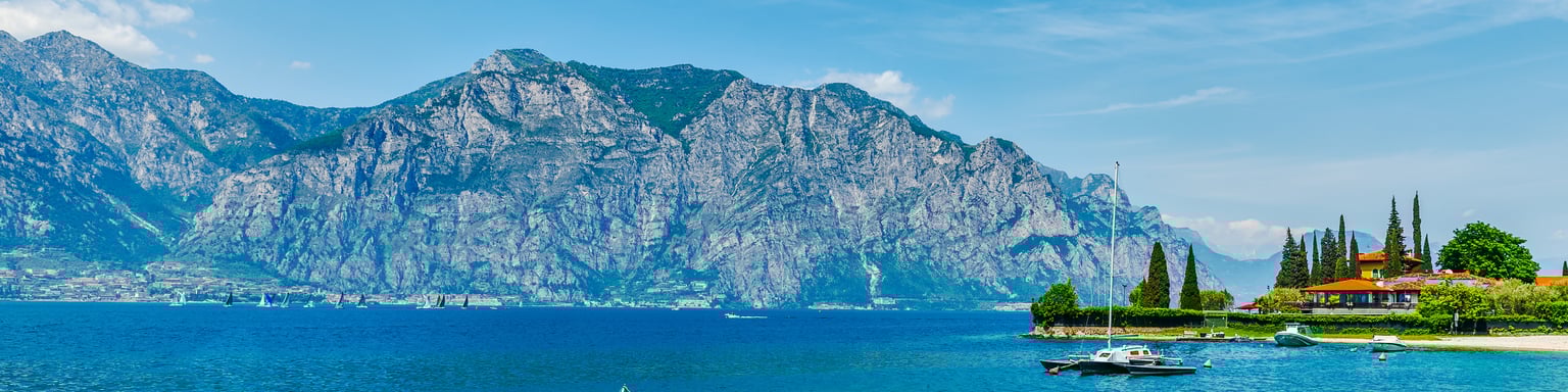 A beach on Lake Garda in Italy in the summer.