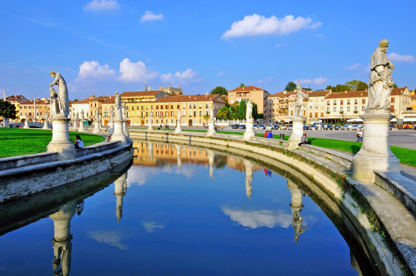 Sculptures along river in Padua, Italy