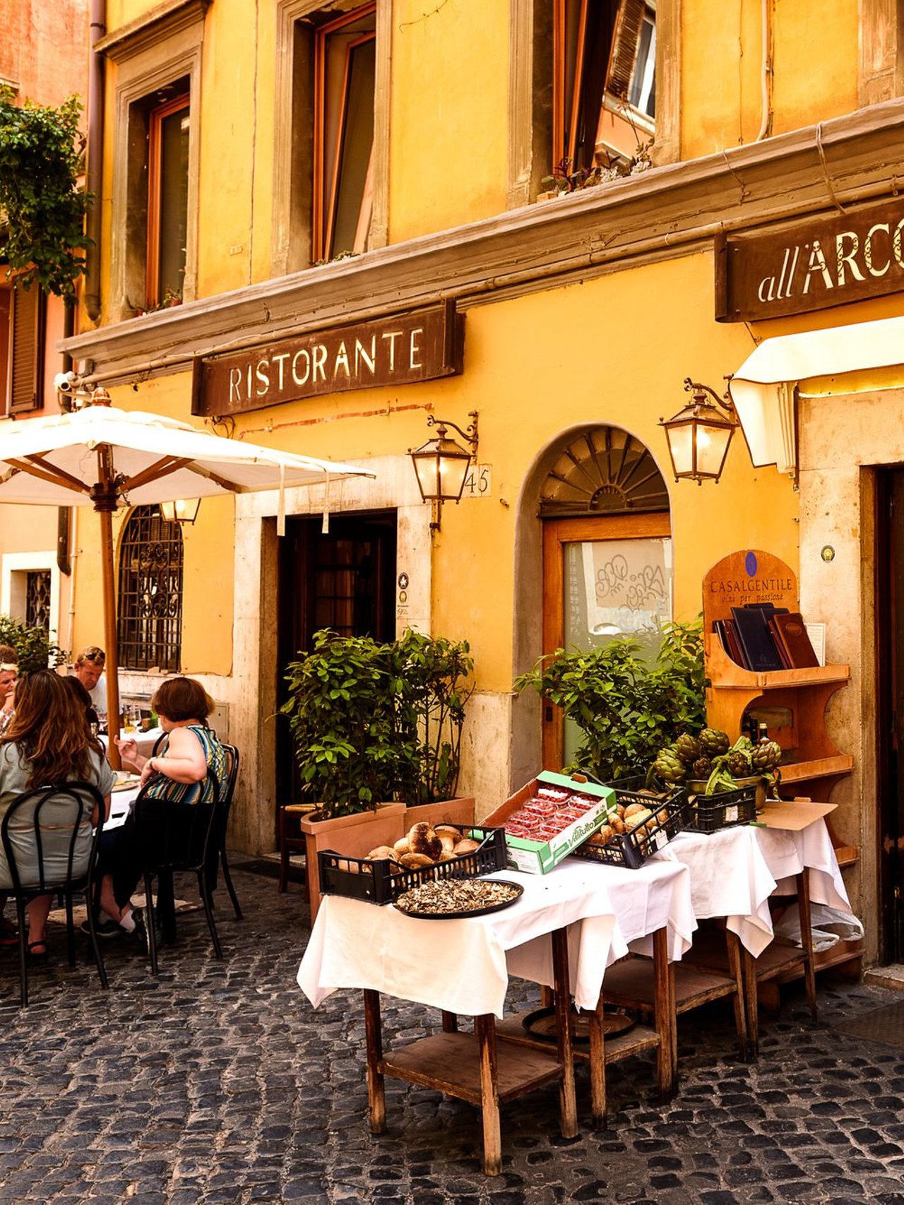 People eating at a restaurant in Rome