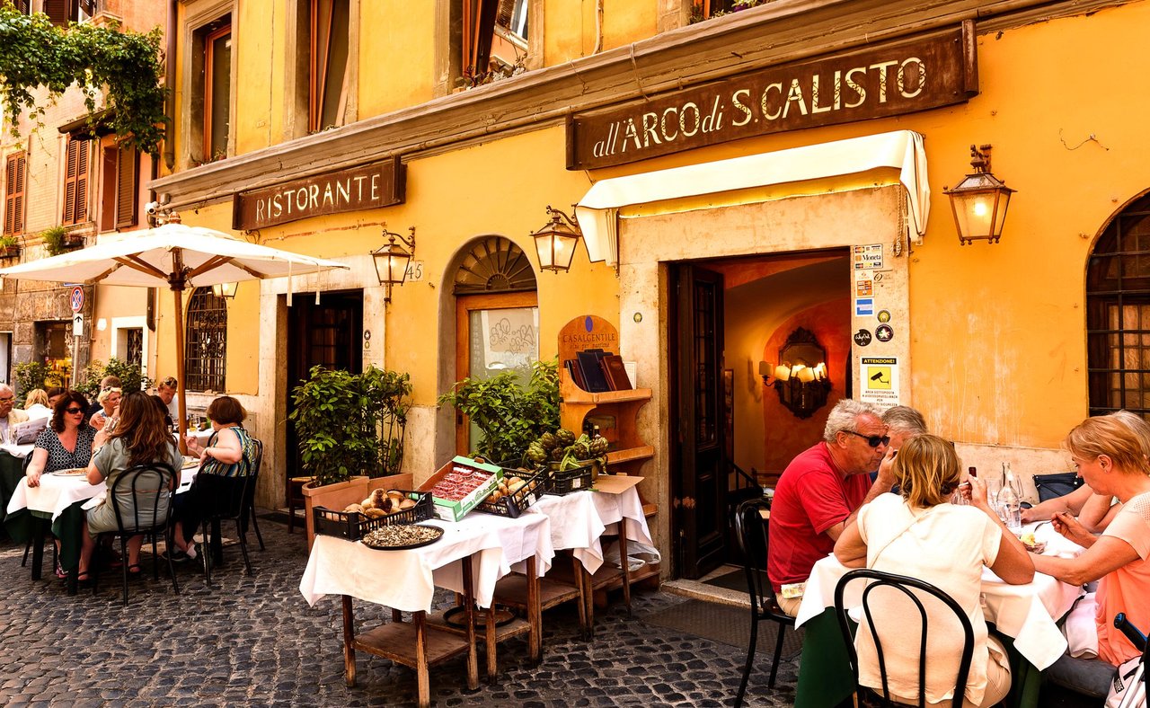 People eating at a restaurant in Rome