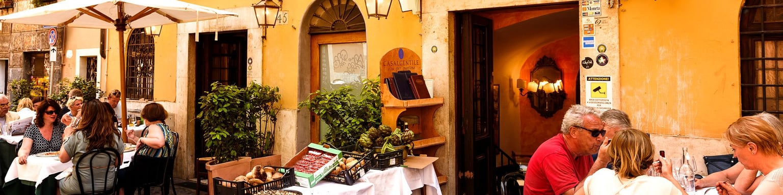 People eating at a restaurant in Rome