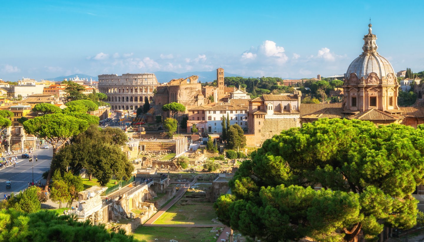 Skyline of historic Rome with the Colosseum in the distance.
