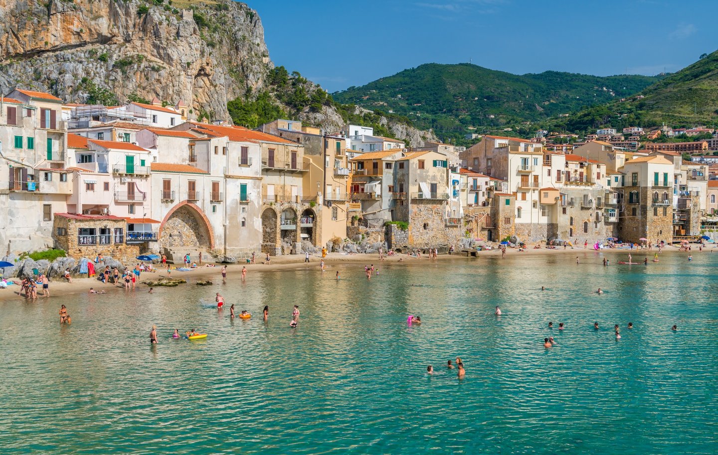 The picturesque Cefalu waterfront on a sunny summer day 