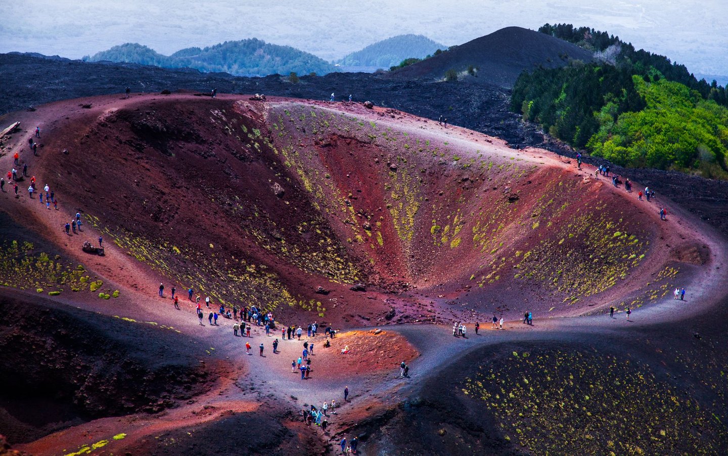 People in a crater at Etna National Park.