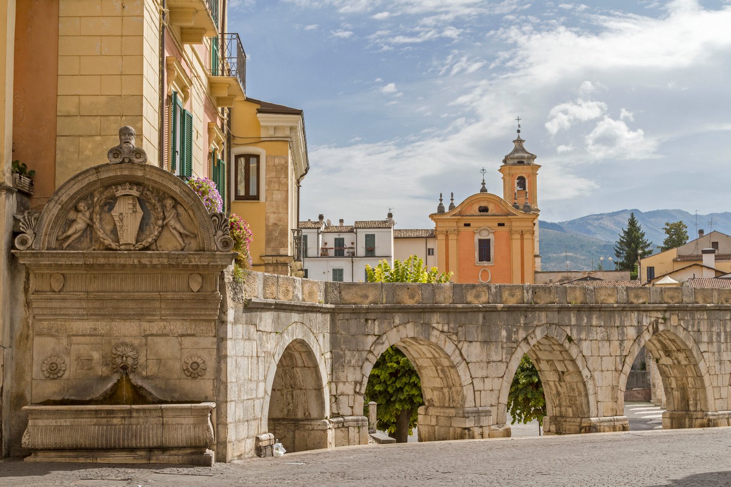 The Fontana del Vecchio and historic aqueduct in Sulmona, Italy