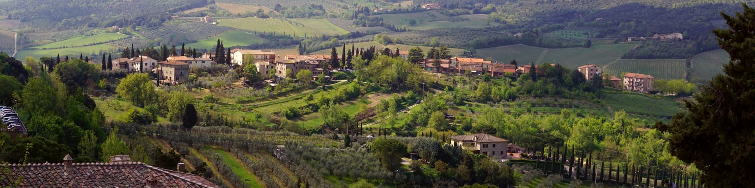 The rolling hills and walled villages of Tuscany.
