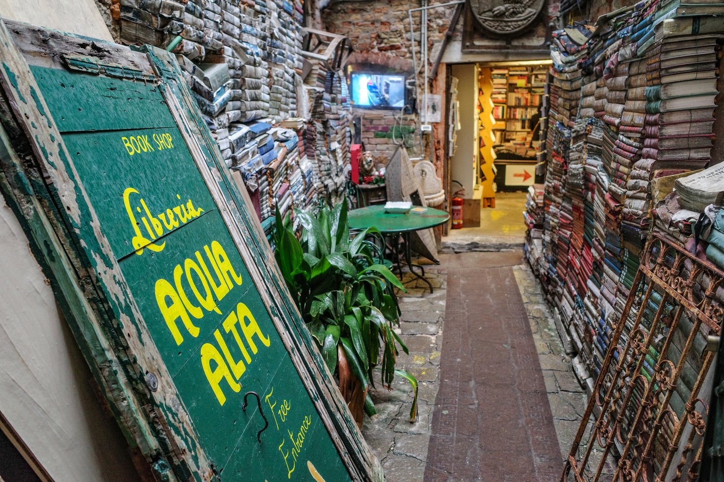 The entrance of the Libreria Acqua Alta bookstore in Venice, Italy.
