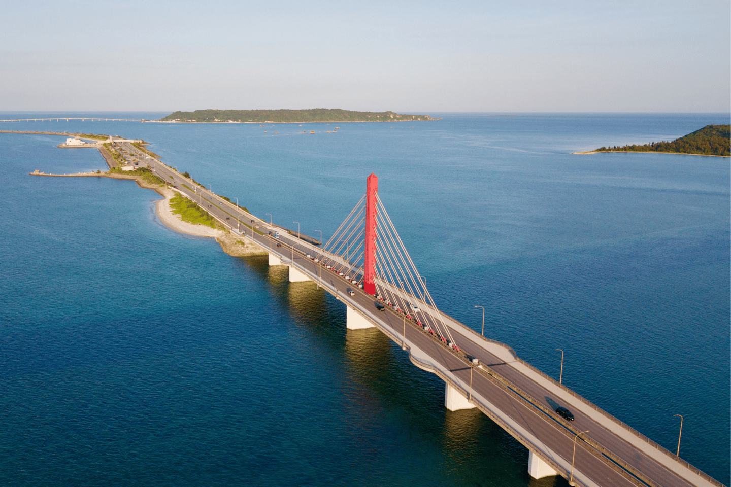Sun setting on a bridge in Okinawa, Japan