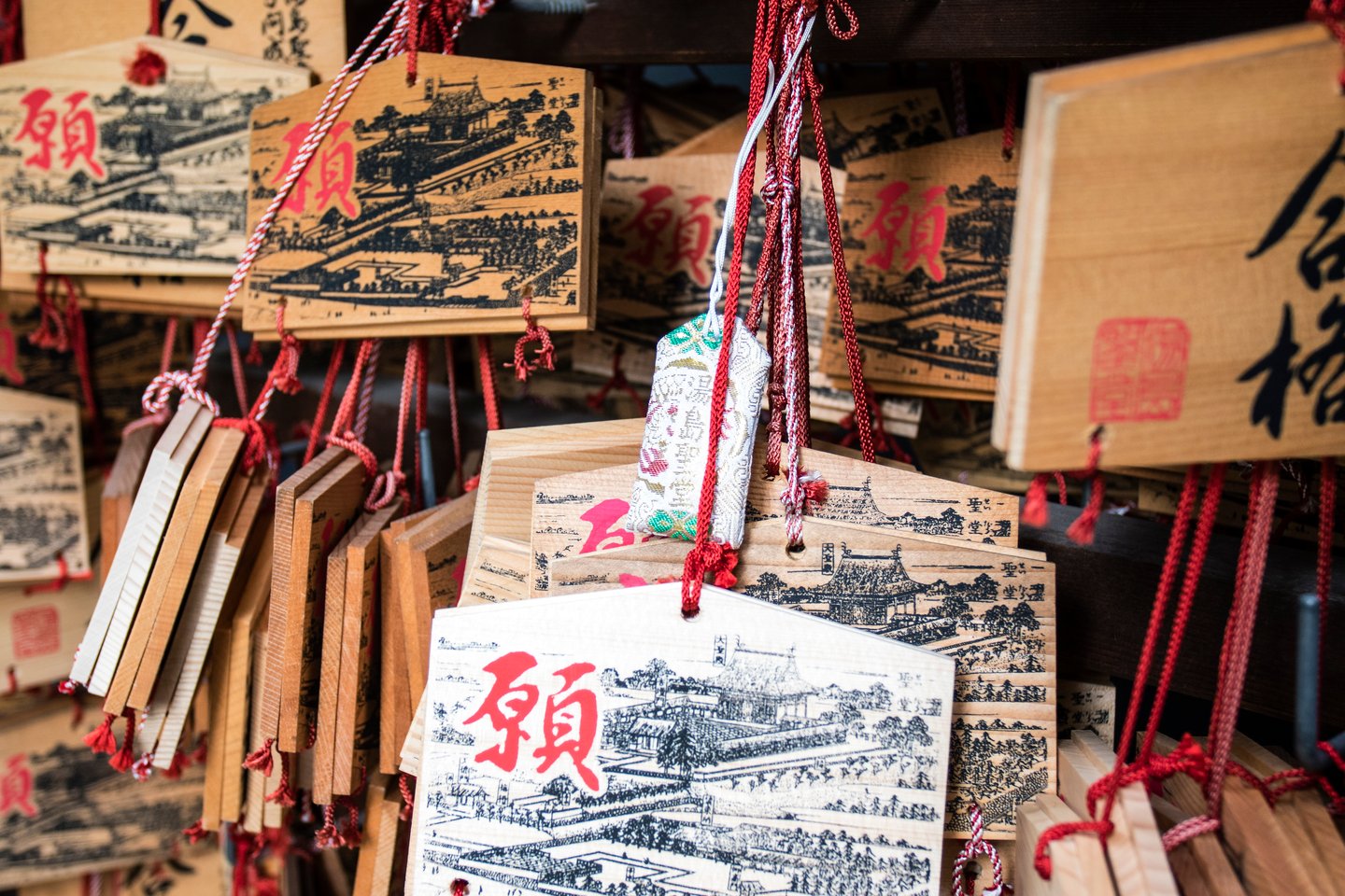Ema (wooden plaques) in the Shinto shrine in Ueno Park in Tokyo, Japan