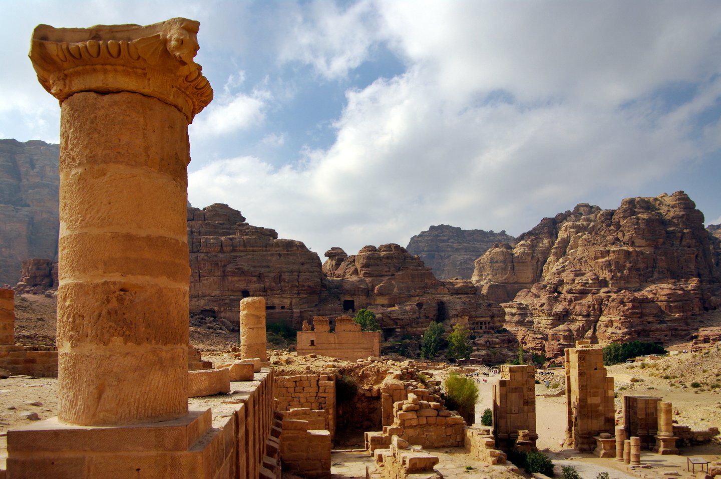 A pillar and scattered ruins in Petra