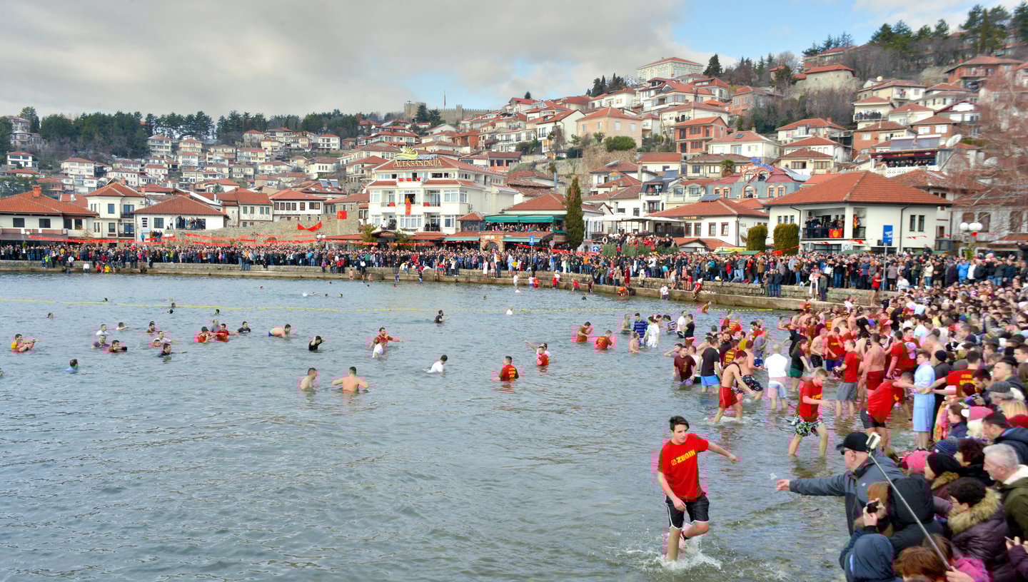 Men in Lake Orid in winter for the Vodici (Epiphany) festival