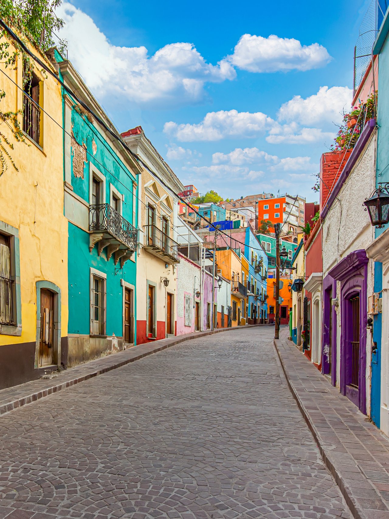 Colourful buildings lining a street in Guanajuato City, Mexico.