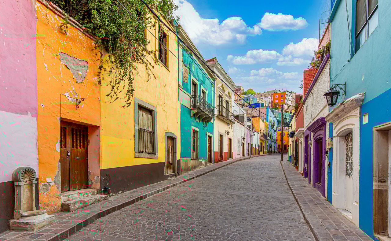Colourful buildings lining a street in Guanajuato City, Mexico.